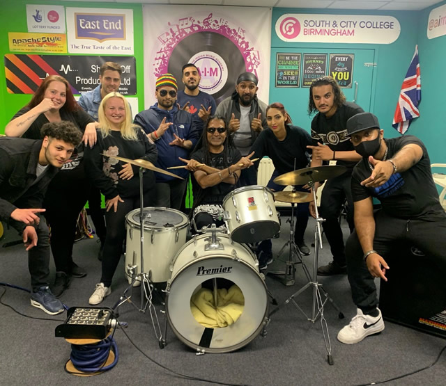 Jay Productions (bottom right with hat) with Apache Indian (middle with drum sticks) at Apache Indian Music Academy in Handsworth, Birmingham